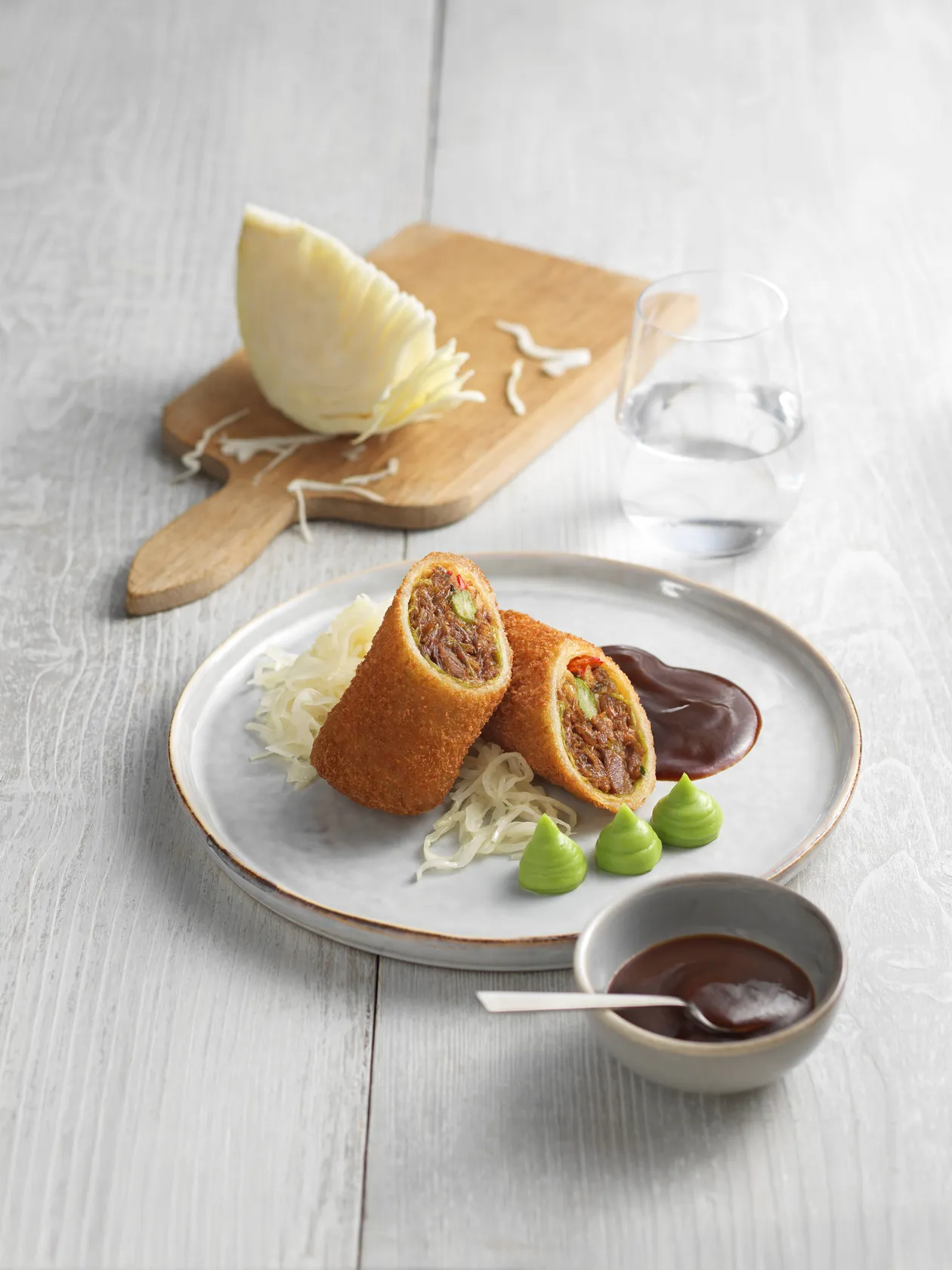 CRISPY DUCK ROLL with coleslaw and avocado cream