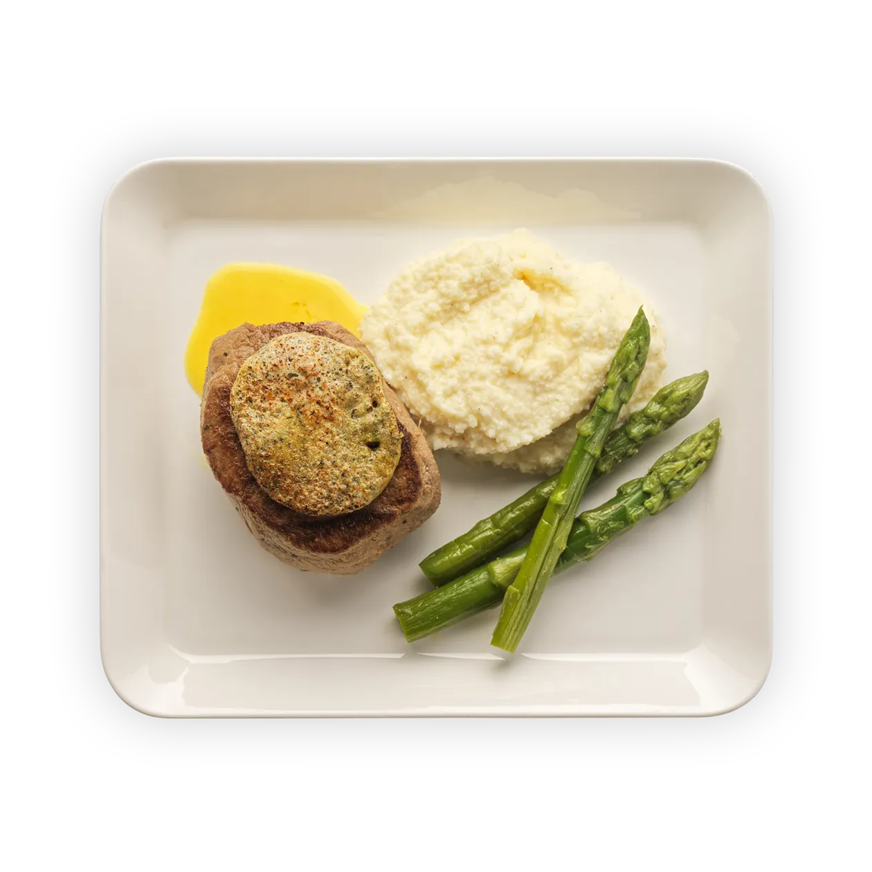 Veal filet with Parmesan crust | Saffron cream sauce | Semolina and green asparagus